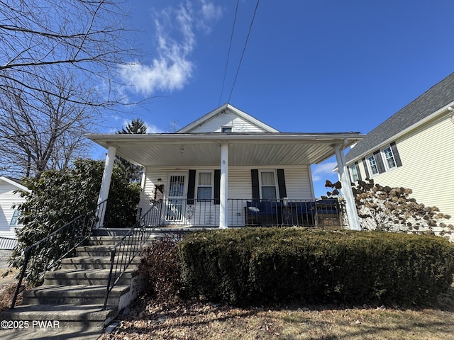 bungalow-style house featuring covered porch