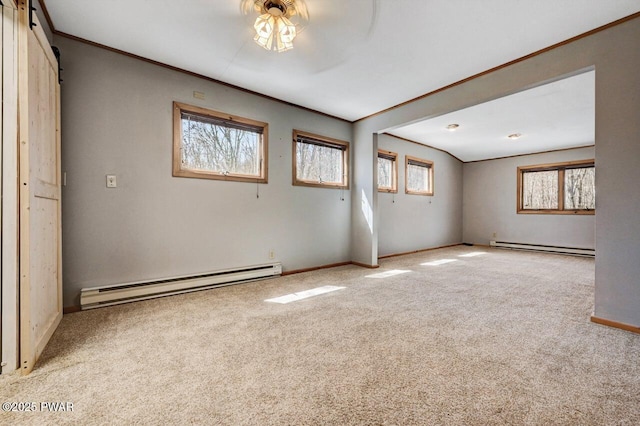 carpeted empty room featuring ornamental molding, baseboards, and a baseboard radiator