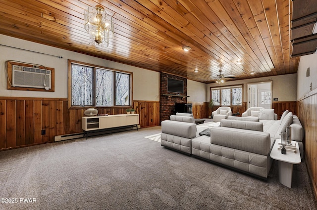 interior space with a wall mounted AC, a fireplace, wooden walls, wood ceiling, and wainscoting