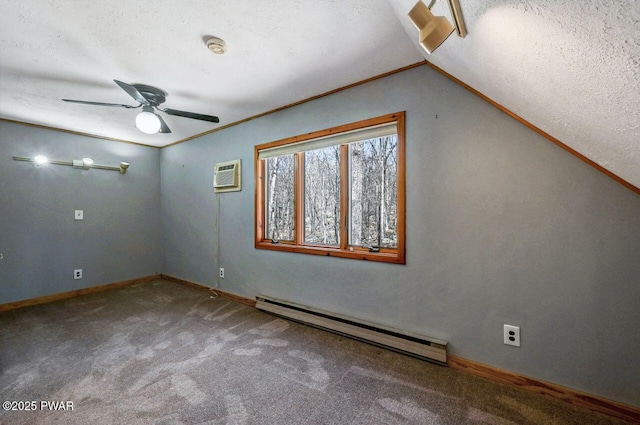 carpeted empty room with a ceiling fan, baseboards, an AC wall unit, lofted ceiling, and a baseboard radiator