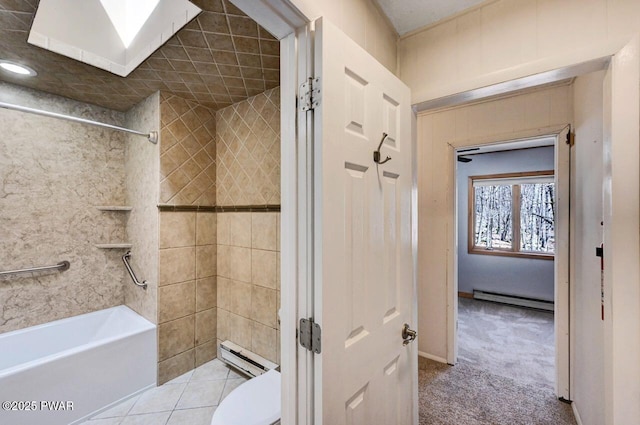 full bath featuring toilet, a skylight, baseboard heating, and tub / shower combination