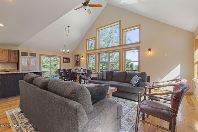 980 Long Ridge Rd, Hawley, PA 18428 - living room with high vaulted ceiling, a chandelier, light wood-style floors, ceiling fan, and recessed lighting
