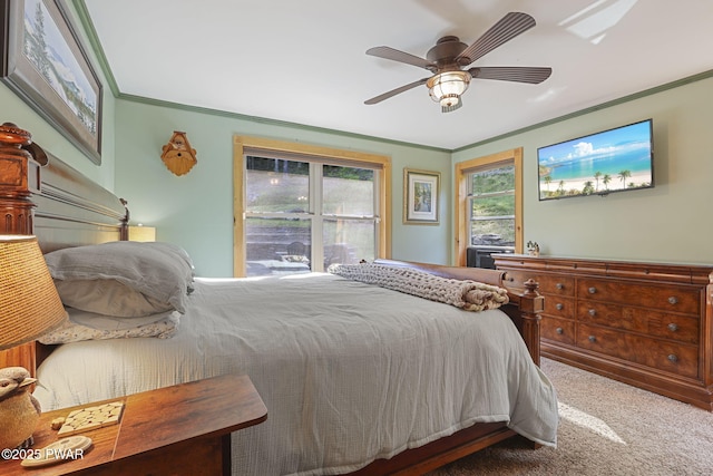 980 Long Ridge Rd, Hawley, PA 18428 - bedroom with crown molding, carpet floors, and a ceiling fan
