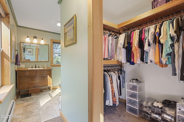 980 Long Ridge Rd, Hawley, PA 18428 - walk in closet featuring a baseboard heating unit and a sink