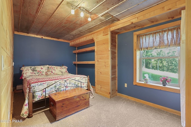 980 Long Ridge Rd, Hawley, PA 18428 - carpeted bedroom with wood ceiling and a baseboard radiator