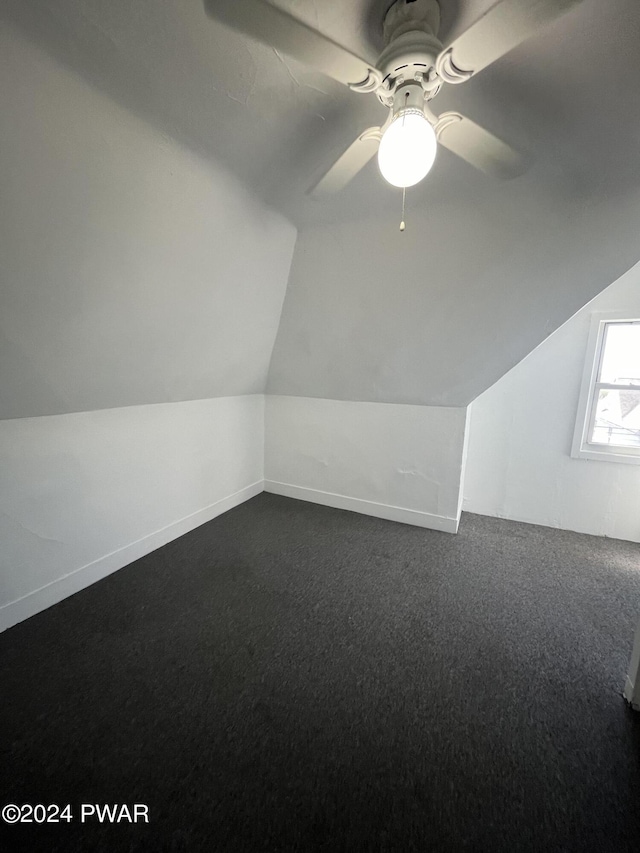 bonus room featuring carpet floors, ceiling fan, and lofted ceiling