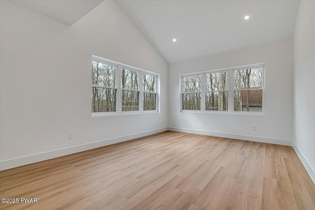 328 Forest Dr, Lords Valley, PA 18428 - unfurnished room with healthy amount of natural light, recessed lighting, light wood-style flooring, and high vaulted ceiling