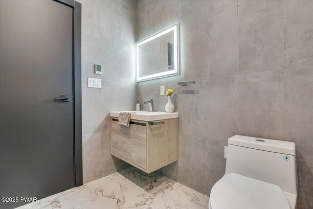 328 Forest Dr, Lords Valley, PA 18428 - half bath featuring vanity and tile walls