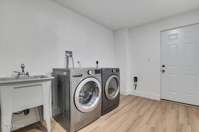 328 Forest Dr, Lords Valley, PA 18428 - washroom featuring independent washer and dryer and light wood-type flooring