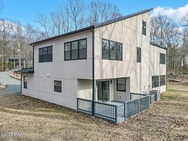 328 Forest Dr, Lords Valley, PA 18428 - view of home's exterior with stucco siding