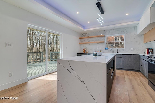 328 Forest Dr, Lords Valley, PA 18428 - kitchen with a kitchen island, modern cabinets, light wood finished floors, and recessed lighting