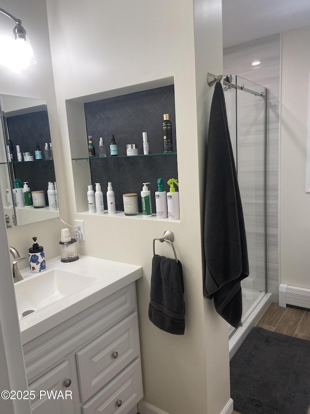 110 Stonefield Rd, Milford, PA 18337 - bathroom with a shower stall, vanity, and wood finished floors