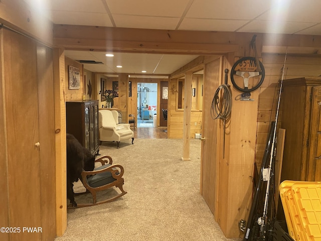 110 Stonefield Rd, Milford, PA 18337 - below grade area with carpet floors, wooden walls, and a drop ceiling