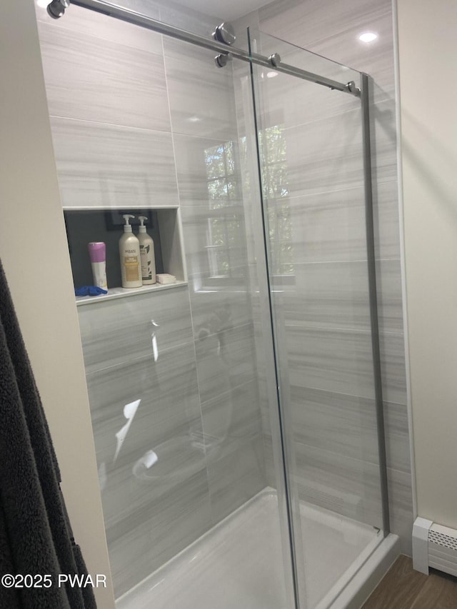 110 Stonefield Rd, Milford, PA 18337 - bathroom featuring a stall shower and a baseboard radiator