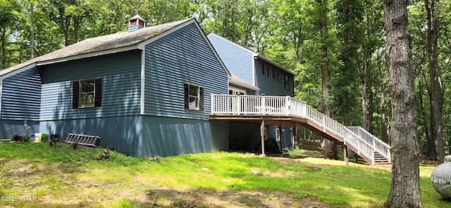 110 Stonefield Rd, Milford, PA 18337 - view of side of home featuring stairs, a wooden deck, and a yard