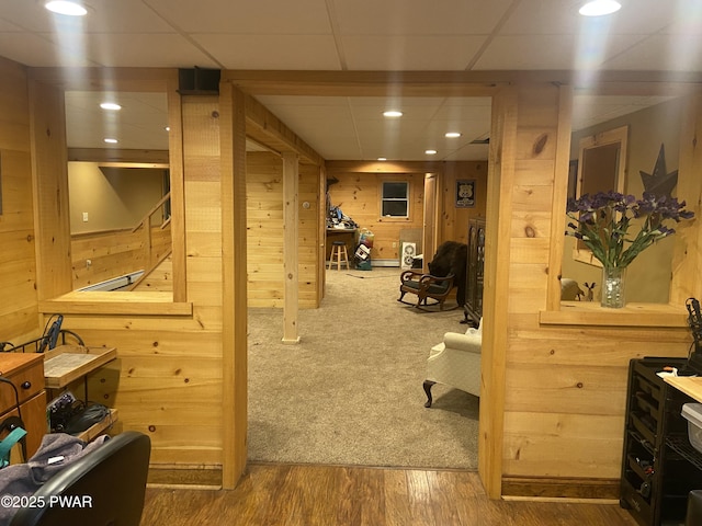 110 Stonefield Rd, Milford, PA 18337 - hallway featuring wood walls, wood finished floors, recessed lighting, and a paneled ceiling