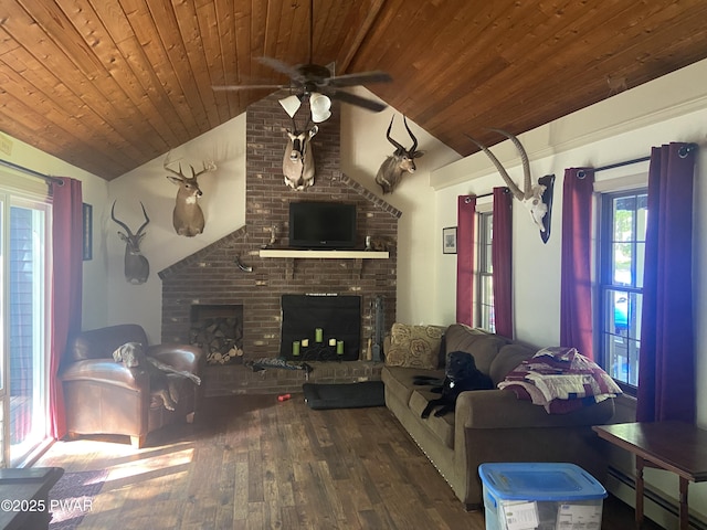 110 Stonefield Rd, Milford, PA 18337 - living room with a baseboard radiator, lofted ceiling, wood finished floors, wood ceiling, and a ceiling fan