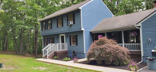 110 Stonefield Rd, Milford, PA 18337 - colonial-style house with cooling unit, a front lawn, and a shingled roof