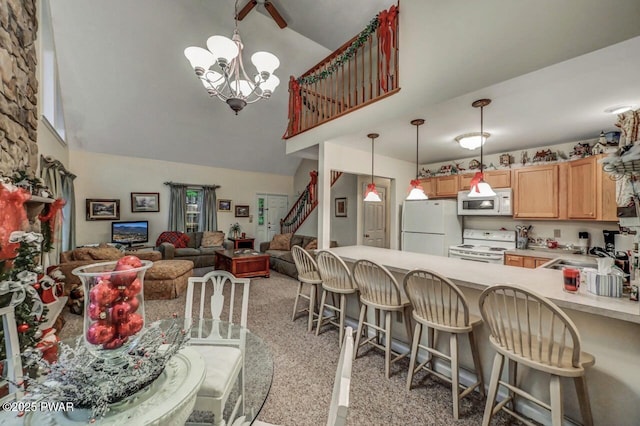 107 Musket Dr, Lackawaxen, PA 18435 - kitchen featuring white appliances, high vaulted ceiling, a peninsula, light brown cabinetry, and a sink