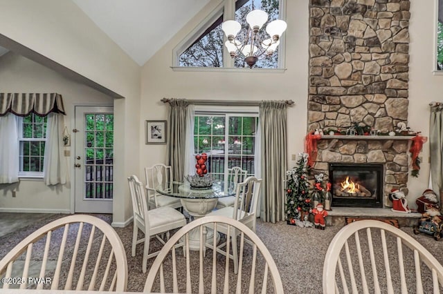 107 Musket Dr, Lackawaxen, PA 18435 - dining room featuring carpet floors, healthy amount of natural light, a fireplace, and high vaulted ceiling