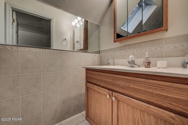 107 Musket Dr, Lackawaxen, PA 18435 - bathroom with tile walls, vanity, and tile patterned flooring