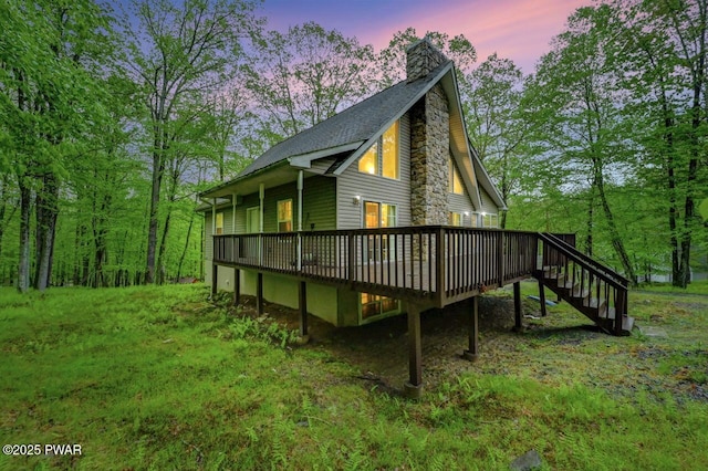 107 Musket Dr, Lackawaxen, PA 18435 - view of home's exterior with a chimney, a wooden deck, and stairs
