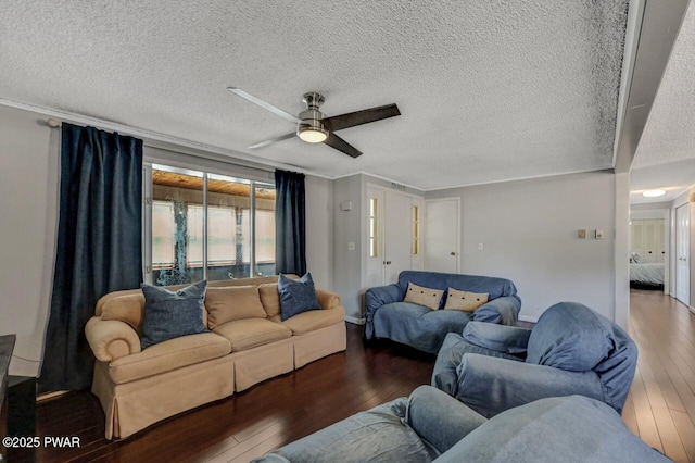 living room featuring a textured ceiling, a ceiling fan, and hardwood / wood-style floors