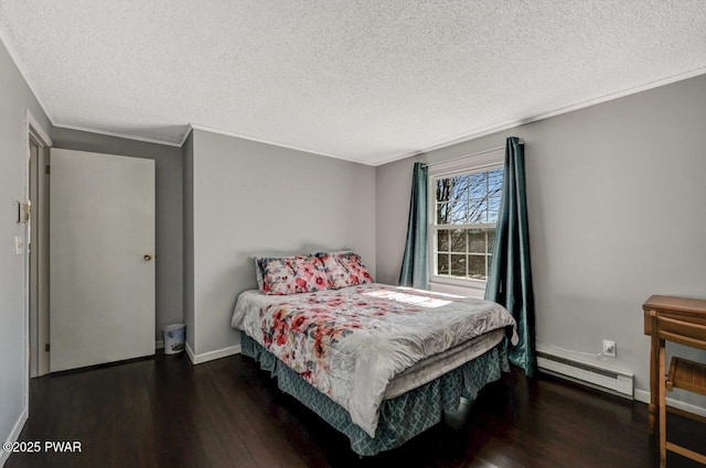 bedroom featuring baseboards, a baseboard radiator, ornamental molding, wood-type flooring, and a textured ceiling