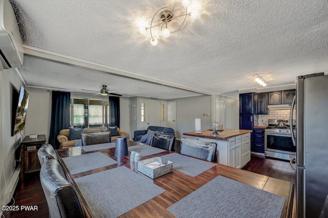 dining space with a textured ceiling, a wall mounted AC, ceiling fan, and dark wood-style flooring