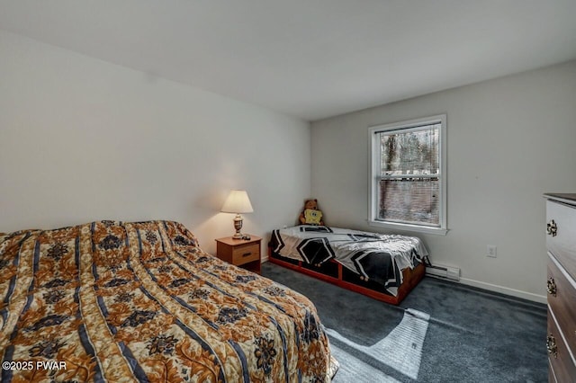 carpeted bedroom featuring baseboard heating