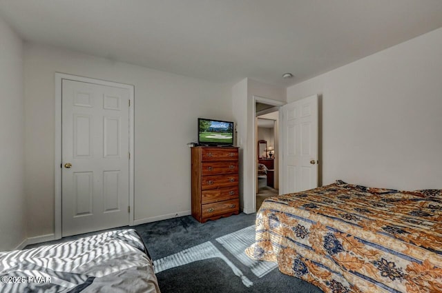 bedroom featuring dark colored carpet