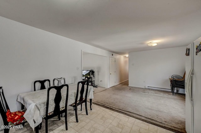 dining area with baseboard heating