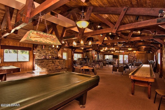 game room with wood ceiling, billiards, vaulted ceiling with beams, wooden walls, and carpet flooring