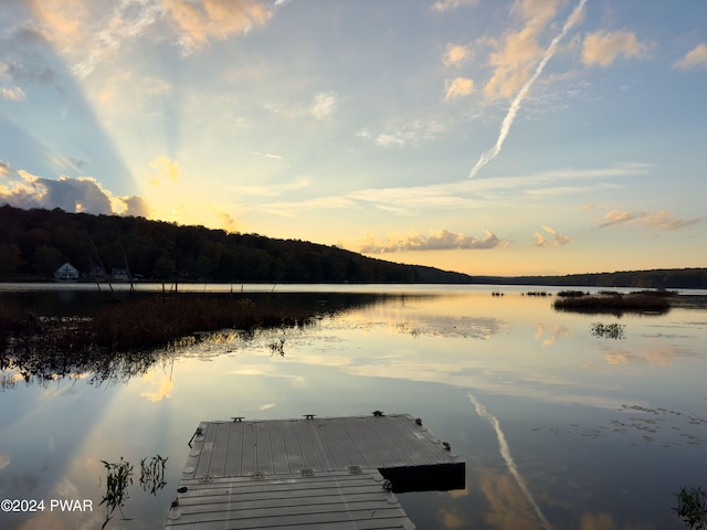 view of dock with a water view