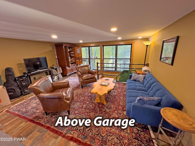 living room featuring recessed lighting and wood finished floors
