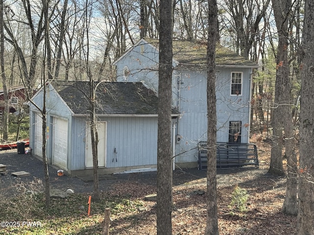 exterior space with a garage