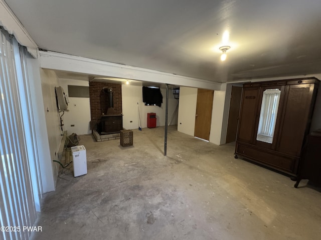 basement featuring a wood stove