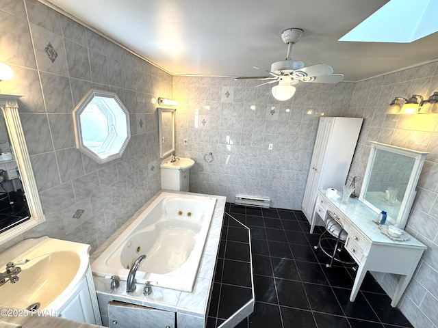 bathroom featuring tile walls, tile patterned flooring, a skylight, and a bath