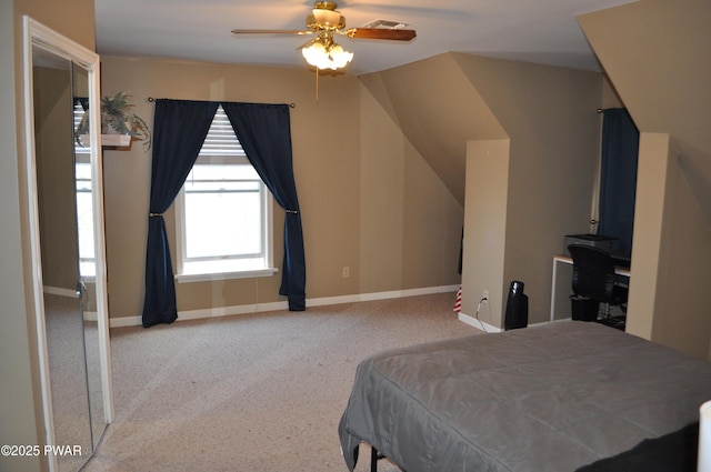 bedroom with a ceiling fan, visible vents, and baseboards