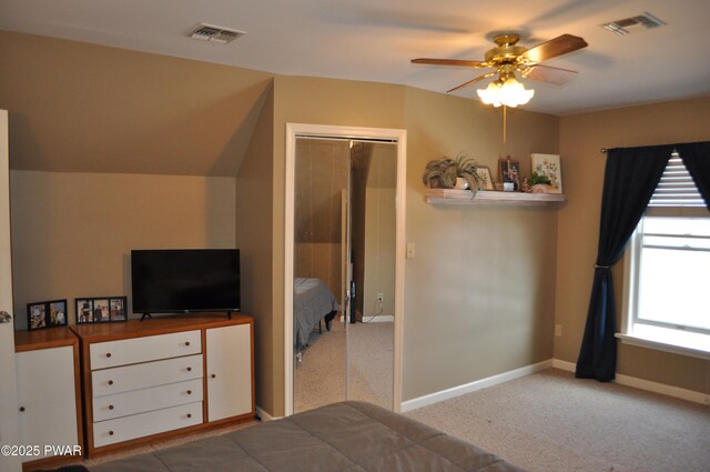 unfurnished bedroom featuring carpet floors, baseboards, and visible vents