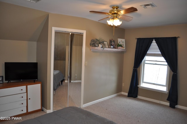 unfurnished bedroom featuring a closet, carpet, visible vents, and baseboards