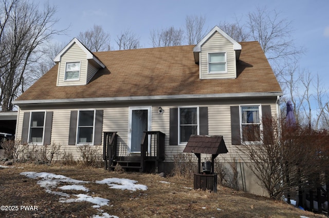 view of new england style home