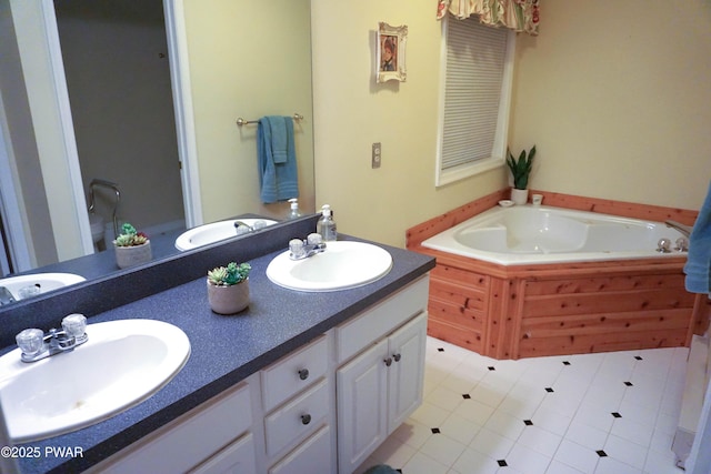 bathroom featuring vanity and a bathtub