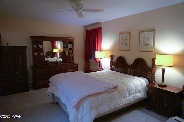 carpeted bedroom with ceiling fan