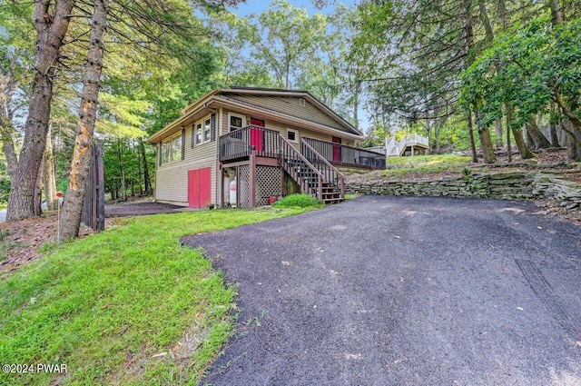 view of property with a wooden deck