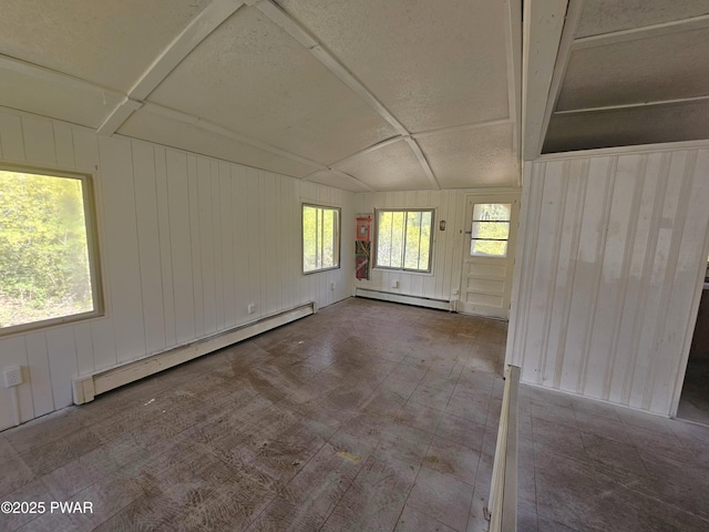 118 Tulip St, Dingmans Ferry, PA 18328 - unfurnished room with a baseboard radiator and wood walls