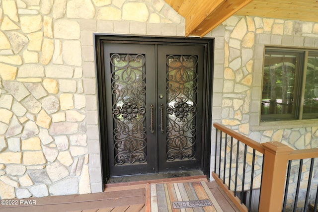 doorway to property featuring french doors