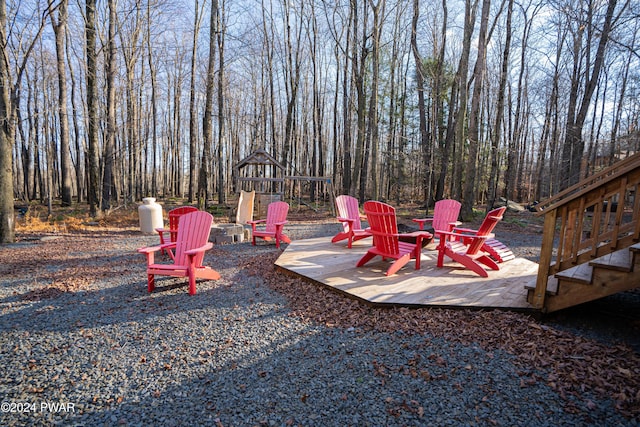 view of yard with a fire pit