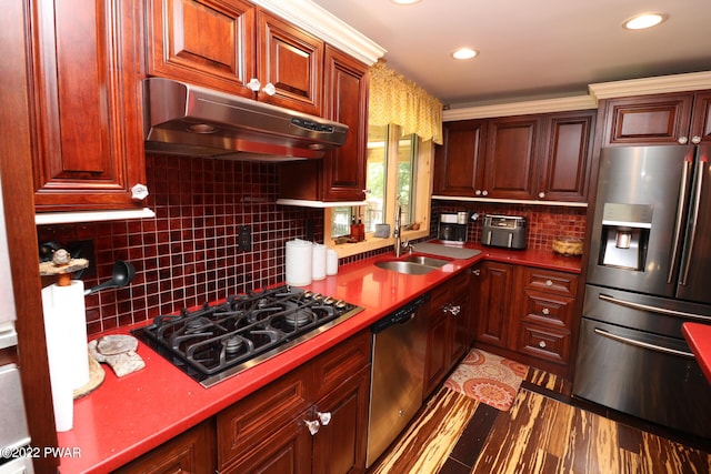 kitchen featuring sink, light wood-type flooring, stainless steel appliances, and tasteful backsplash