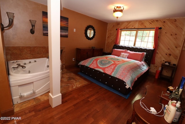 bedroom featuring dark wood-type flooring